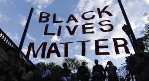 People take part in a rally on April 29, 2015 at Union Square in New York, held in solidarity with demonstrators in Baltimore, Maryland demanding justice for an African-American man who died of severe spinal injuries sustained in police custody. AFP PHOTO/Eduardo Munoz Alvarez (Photo credit should read EDUARDO MUNOZ ALVAREZ/AFP/Getty Images)